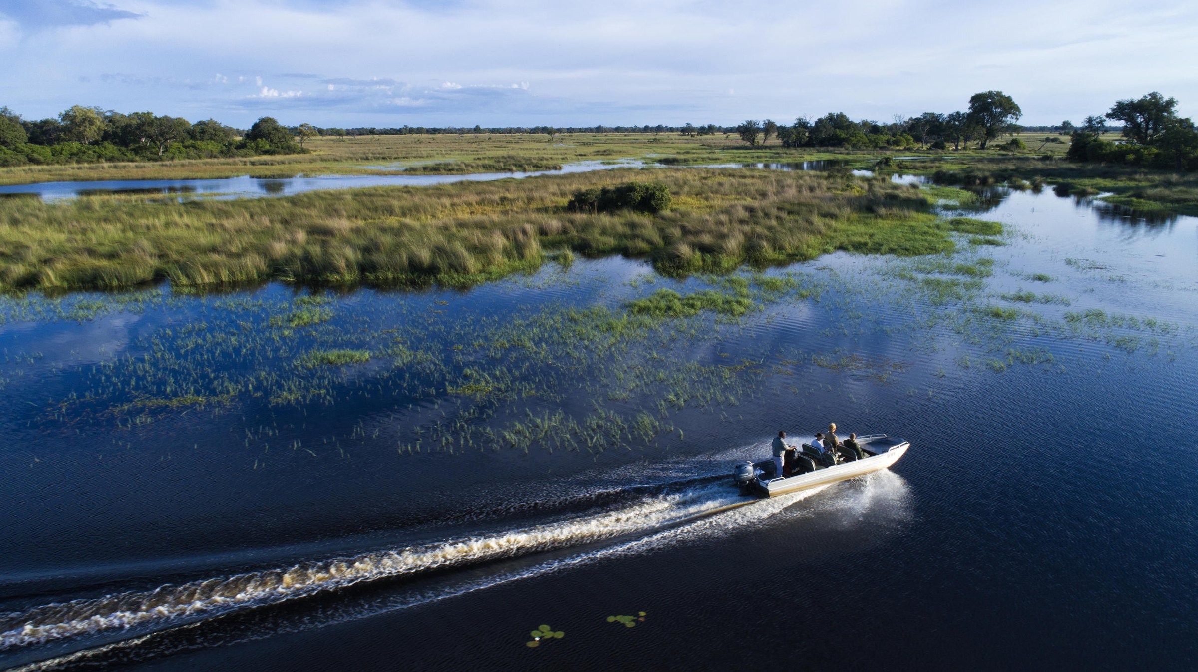 Private boat safari in Botswana with open water and a quiet sense of transition
