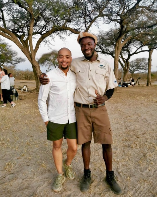 Mason & Wild founder Zannon James with a safari guide in the Khwai area of Botswana.