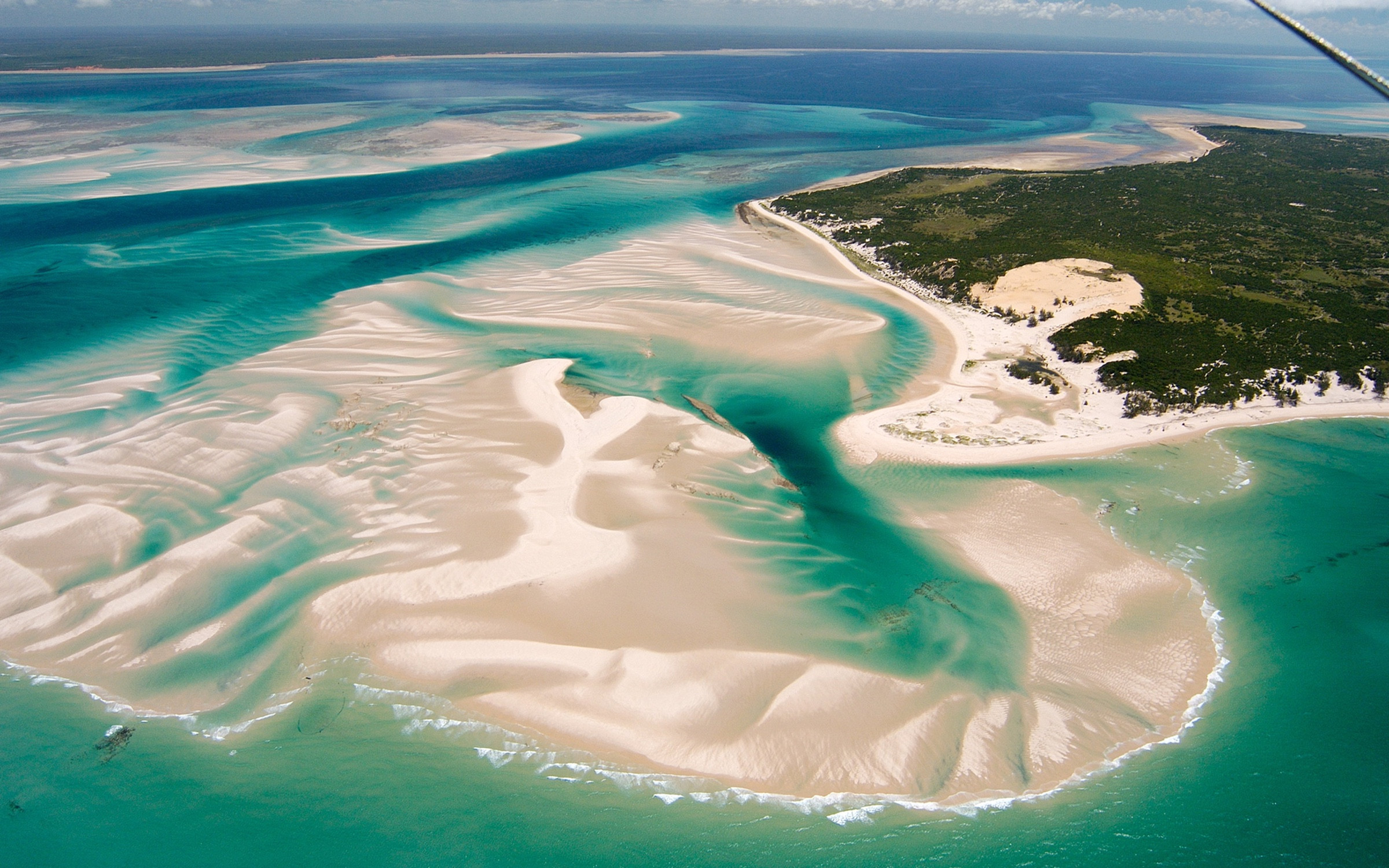 Aerial view of turquoise channels, white sandbanks and islands in Mozambique’s Bazaruto Archipelago.