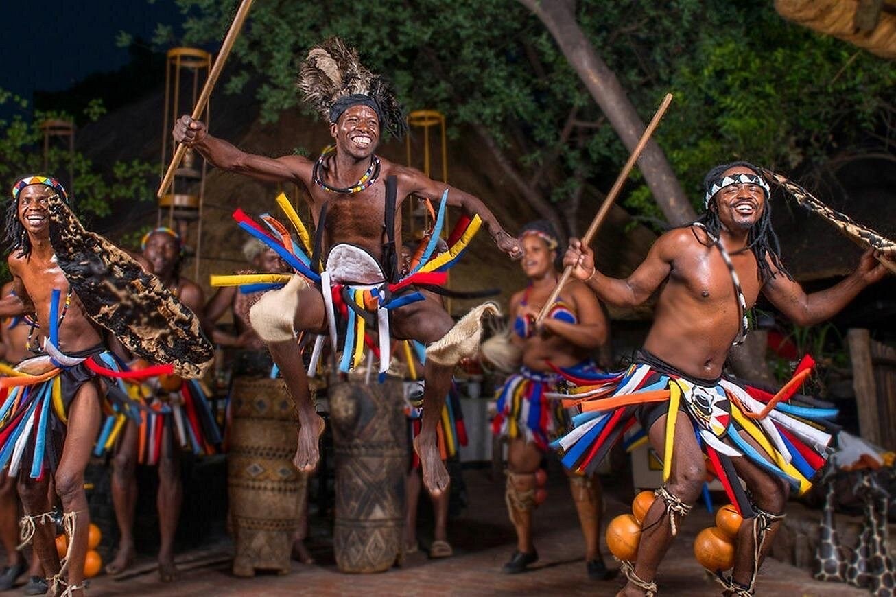 Dancers performing with drums in Livingstone, Zambia
