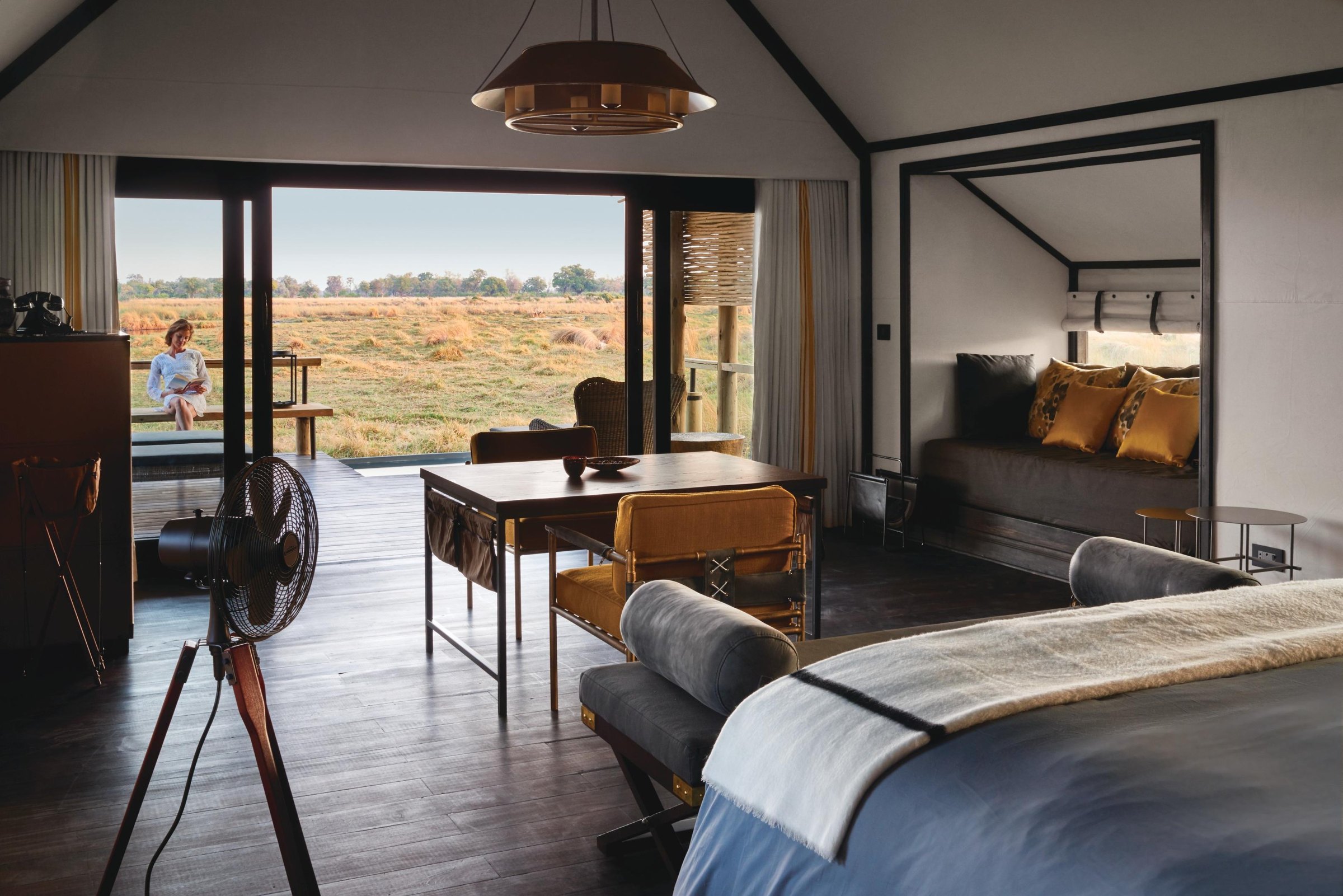 Elegant Belmond Eagle Island Lodge suite opening onto Botswana wilderness