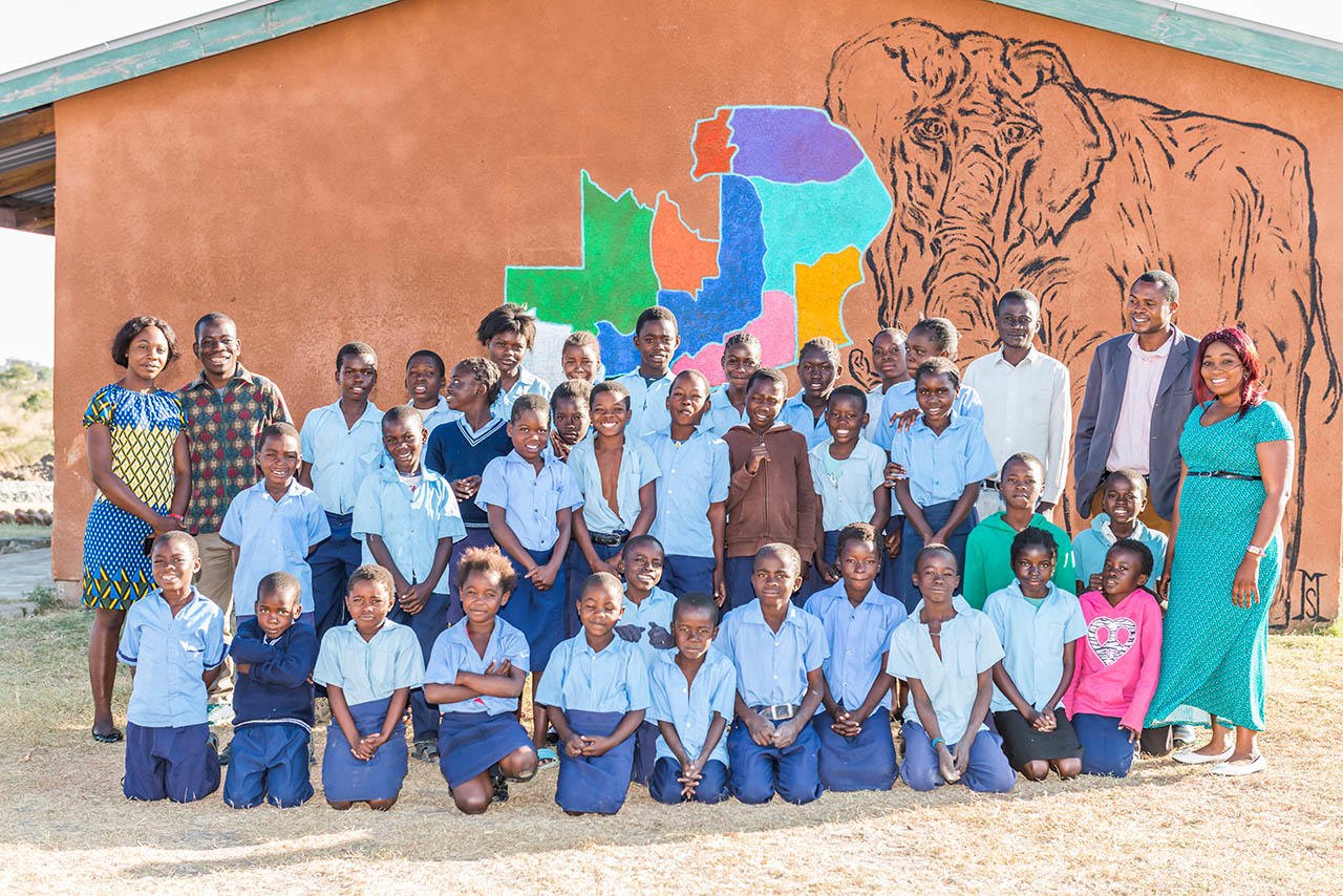 Schoolchildren and community life connected to safari tourism in Zambia
